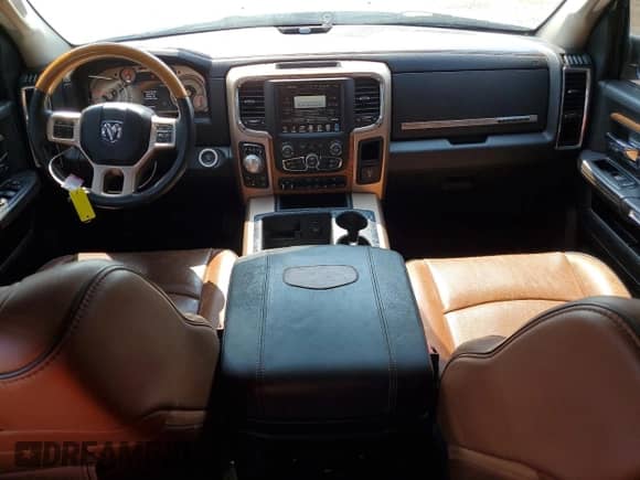 2013 Ram 1500 Laramie Longhorn z VIN 1C6RR7PT5DS706890, wystawiony jako Copart lot #65699545 z przebiegiem 187 642 mil mil oraz Szkoda całkowita • Salvage title. Historia ofert i sprzedaży dostępna na DreamBid. Obrazek 8.