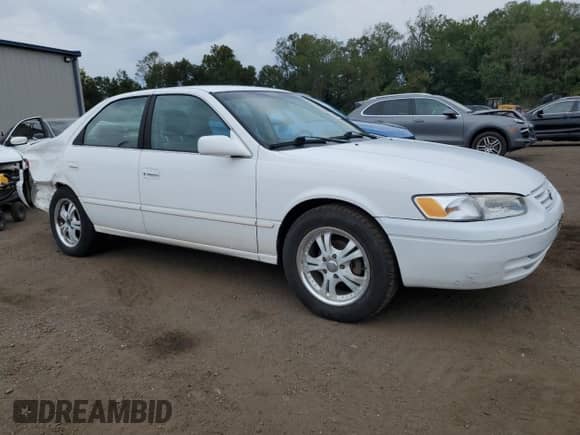 1999 Toyota Camry LE z VIN JT2BG22KXX0272539, wystawiony jako Copart lot #83966585 z przebiegiem 189 447 mil mil oraz Szkoda całkowita • Salvage title. Historia ofert i sprzedaży dostępna na DreamBid. Obrazek 4.