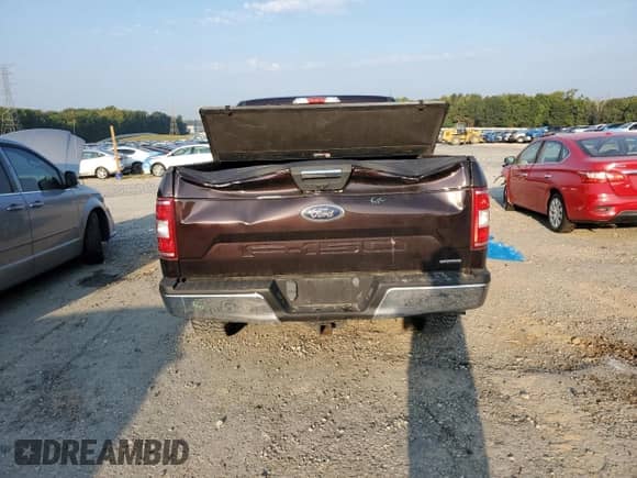 2018 Ford F-150 XLT z VIN 1FTEW1EP4JKD91319, wystawiony jako Copart lot #81056815 z przebiegiem 184 452 mil mil oraz Szkoda całkowita • Salvage title. Historia ofert i sprzedaży dostępna na DreamBid. Obrazek 6.