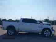 2014 Ram 1500 Laramie with VIN 1C6RR6NT9ES100703, listed as a IAAI auction lot 39869453 with Not provided miles and . Bid and sale history available at DreamBid. Image 12.