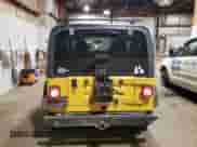 2000 Jeep Wrangler Sport z VIN 1J4FA49S7YP735946, wystawiony jako Copart lot #68370665 z przebiegiem 201 407 mil mil oraz Szkoda całkowita • Salvage title. Historia ofert i sprzedaży dostępna na DreamBid. Obrazek 6.