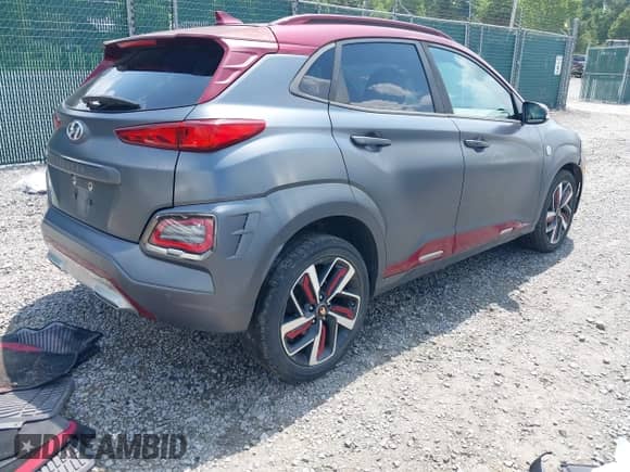2019 Hyundai Kona Ultimate with VIN KM8K53A57KU305248, listed as a IAAI auction lot 42983089 with 58,329 mi miles and . Bid and sale history available at DreamBid. Image 4.