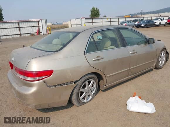 2004 Honda Accord EX with VIN JHMCM56614C031240, listed as a IAAI auction lot 43145132 with 135,971 mi miles and . Bid and sale history available at DreamBid. Image 4.