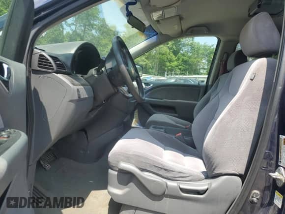 2007 Honda Odyssey LX с VIN 5FNRL38287B082674, выставлен на аукционе Copart как лот 63441695 с пробегом Не указан миль и Списание • Salvage title. История ставок и продаж доступна на DreamBid. Изображение 7.