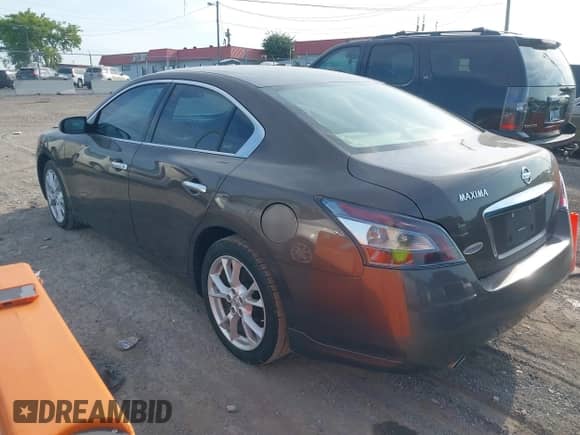2013 Nissan Maxima S with VIN 1N4AA5AP3DC810890, listed as a IAAI auction lot 42856419 with 103,568 mi miles and . Bid and sale history available at DreamBid. Image 3.