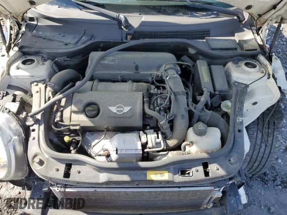 2011 MINI Hardtop S with VIN WMWSV3C50BTY15977, listed as a Copart auction lot 52802295 with 89,085 mi miles and Salvage title. Bid and sale history available at DreamBid. Image 11.