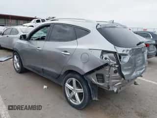 2014 Hyundai Tucson SE z VIN KM8JU3AG5EU909045, wystawiony jako IAAI lot #43144496 z przebiegiem 88 474 mil mil oraz . Historia ofert i sprzedaży dostępna na DreamBid. Obrazek 3.