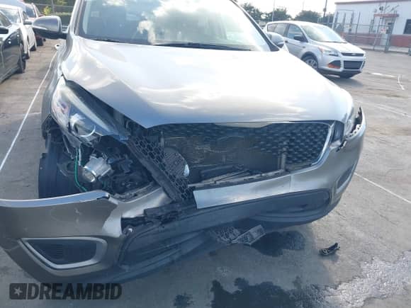 2018 Kia Sorento L с VIN 5XYPG4A34JG422780, выставлен на аукционе IAAI как лот 43264925 с пробегом 100 185 миль миль и . История ставок и продаж доступна на DreamBid. Изображение 6.