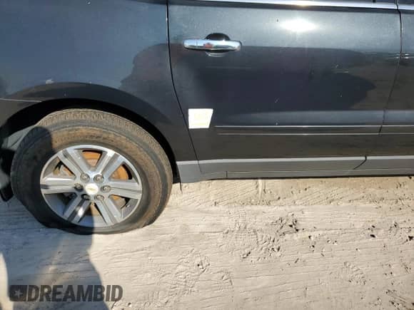 2015 Chevrolet Traverse LT с VIN 1GNKRGKDXFJ324106, выставлен на аукционе Copart как лот 76164904 с пробегом 92 884 миль миль и Списание • Salvage title. История ставок и продаж доступна на DreamBid. Изображение 13.