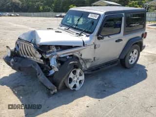 2020 Jeep Wrangler Sport S with VIN 1C4GJXAG8LW215563, listed as a Copart auction lot 70423945 with 69,559 mi miles and Salvage title. Bid and sale history available at DreamBid. Image 1.