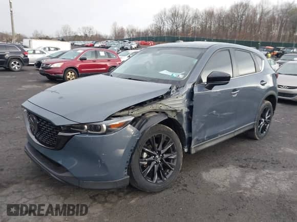 2022 Mazda CX-5 S Carbon Edition z VIN JM3KFBCM9N1538707, wystawiony jako IAAI lot #42026877 z przebiegiem 36 077 mil mil oraz . Historia ofert i sprzedaży dostępna na DreamBid. Obrazek 17.