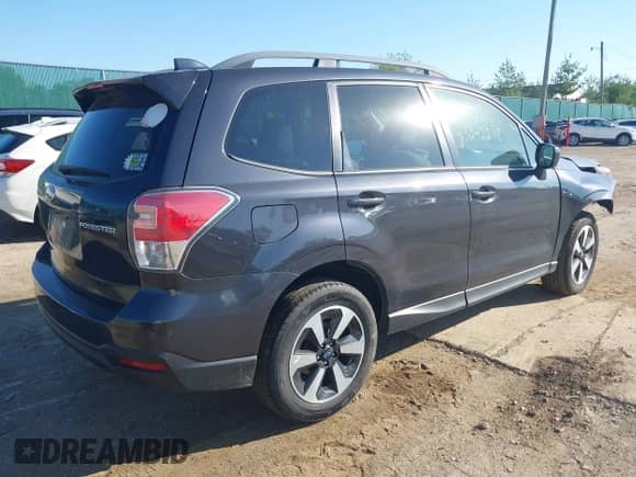 2018 Subaru Forester Premium z VIN JF2SJAGC4JH471942, wystawiony jako IAAI lot #43342248 z przebiegiem 119 890 mil mil oraz . Historia ofert i sprzedaży dostępna na DreamBid. Obrazek 4.