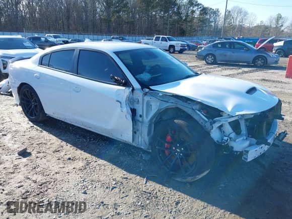2023 Dodge Charger Scat Pack with VIN 2C3CDXGJ4PH626959, listed as a IAAI auction lot 41448760 with 13,201 mi miles and . Bid and sale history available at DreamBid. Image 1.