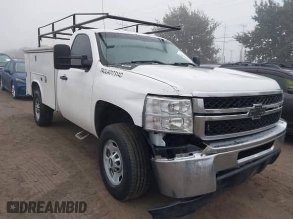 2011 Chevrolet Silverado 2500HD Work Truck with VIN 1GB0CVCG8BF228751, listed as a IAAI auction lot 41444809 with 292,337 mi miles and . Bid and sale history available at DreamBid. Image 1.