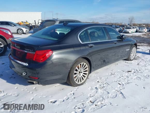 2012 BMW 7 Series 750Li xDrive with VIN WBAKC8C51CC437897, listed as a IAAI auction lot 41542970 with 133,864 mi miles and . Bid and sale history available at DreamBid. Image 4.
