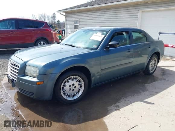 2005 Chrysler 300 300 z VIN 2C3JA43R45H616682, wystawiony jako IAAI lot #41853835 z przebiegiem 158 464 mil mil oraz . Historia ofert i sprzedaży dostępna na DreamBid. Obrazek 2.