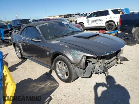 2004 Ford Mustang Deluxe с VIN 1FAFP44404F117628, выставлен на аукционе Copart как лот 81377524 с пробегом 39 697 миль миль и Списание • Salvage title. История ставок и продаж доступна на DreamBid. Изображение 4.