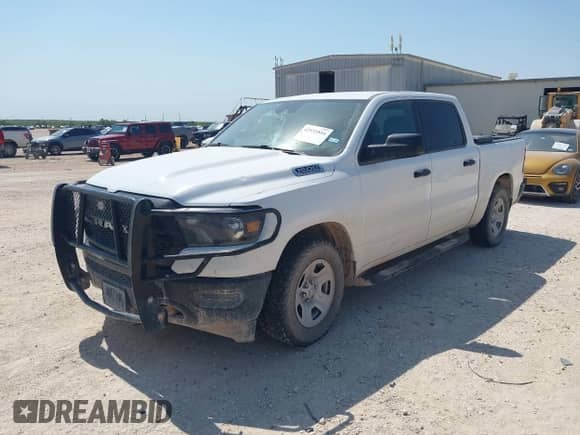 2023 Ram 1500 Tradesman z VIN 1C6SRFGT5PN553622, wystawiony jako IAAI lot #42935816 z przebiegiem 89 940 mil mil oraz . Historia ofert i sprzedaży dostępna na DreamBid. Obrazek 2.