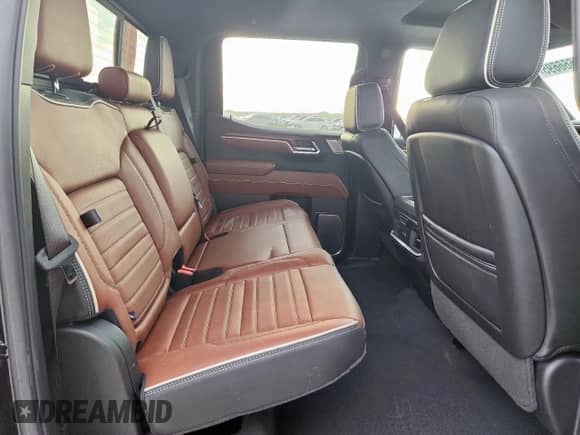 2024 GMC Sierra 1500 Denali Ultimate with VIN 1GTUUHEL1RZ360460, listed as a Copart auction lot 69666695 with 14,710 mi miles and Salvage title. Bid and sale history available at DreamBid. Image 11.