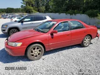 1999 Toyota Camry LE z VIN 4T1BF28K8XU084480, wystawiony jako Copart lot #65584035 z przebiegiem 253 856 mil mil oraz Nie do naprawy • Non repairable. Historia ofert i sprzedaży dostępna na DreamBid. Obrazek 1.