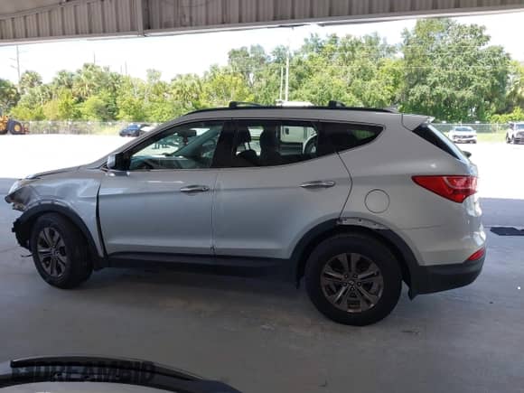 2014 Hyundai Santa Fe с VIN 5XYZU3LB1EG186577, выставлен на аукционе IAAI как лот 43011637 с пробегом 188 209 миль миль и . История ставок и продаж доступна на DreamBid. Изображение 15.
