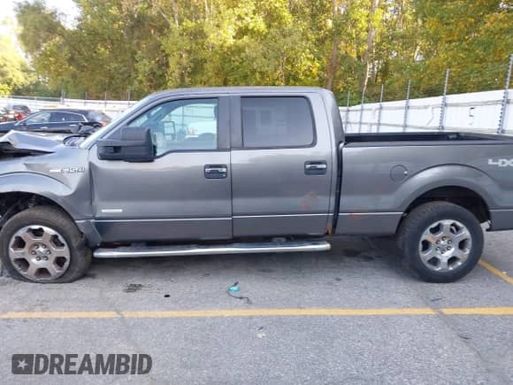 2011 Ford F-150 Lariat with VIN 1FTFW1ET8BFB76490, listed as a IAAI auction lot 43242474 with 165,835 mi miles and . Bid and sale history available at DreamBid. Image 14.