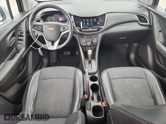 2018 Chevrolet Trax LT с VIN KL7CJPSB6JB617830, выставлен на аукционе Copart как лот 84878065 с пробегом 34 509 миль миль и Списание • Salvage title. История ставок и продаж доступна на DreamBid. Изображение 8.