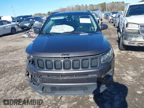 2020 Jeep Compass Latitude with VIN 3C4NJCBB8LT141103, listed as a IAAI auction lot 41263757 with 128,272 mi miles and . Bid and sale history available at DreamBid. Image 13.