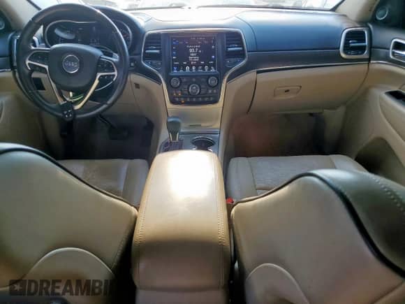 2017 Jeep Grand Cherokee Overland with VIN 1C4RJECG8HC965161, listed as a Copart auction lot 82068045 with 99,654 mi miles and Salvage title. Bid and sale history available at DreamBid. Image 8.