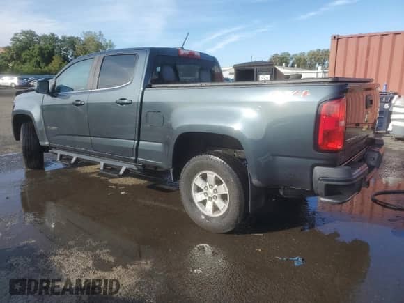 2018 Chevrolet Colorado 4WD Work Truck z VIN 1GCGTBEN6J1203556, wystawiony jako Copart lot #71359055 z przebiegiem 123 555 mil mil oraz Szkoda całkowita • Salvage title. Historia ofert i sprzedaży dostępna na DreamBid. Obrazek 2.