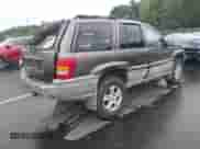 1999 Jeep Grand Cherokee Laredo с VIN 1J4G258S6XC717016, выставлен на аукционе IAAI как лот 43329768 с пробегом 239 308 миль миль и . История ставок и продаж доступна на DreamBid. Изображение 4.