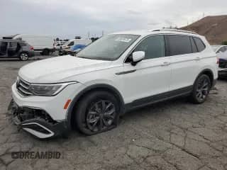 2022 Volkswagen Tiguan SE с VIN 3VV3B7AX8NM067902, выставлен на аукционе Copart как лот 69870475 с пробегом 49 578 миль миль и Списание • Salvage title. История ставок и продаж доступна на DreamBid. Изображение 1.