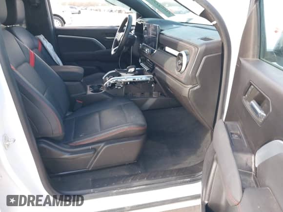 2023 Chevrolet Colorado 4WD Z71 with VIN 1GCPTDEK2P1246012, listed as a IAAI auction lot 41662137 with 14,612 mi miles and . Bid and sale history available at DreamBid. Image 5.