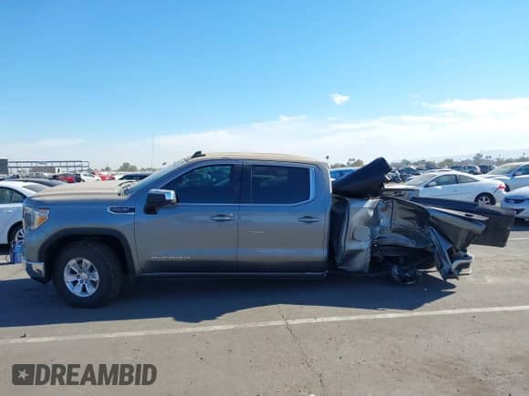 2020 GMC Sierra 1500 SLE with VIN 3GTP8BED5LG294168, listed as a IAAI auction lot 41250703 with 116,668 mi miles and . Bid and sale history available at DreamBid. Image 14.