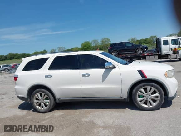2011 Dodge Durango Crew with VIN 1D4SD4GT2BC638064, listed as a IAAI auction lot 42718445 with 167,602 mi miles and . Bid and sale history available at DreamBid. Image 13.