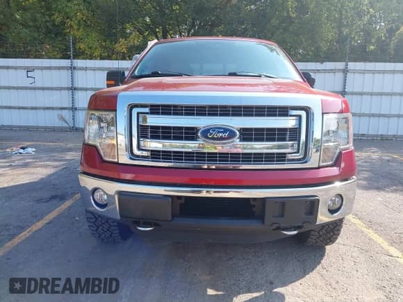 2013 Ford F-150 Lariat with VIN 1FTFW1ET5DKD04467, listed as a IAAI auction lot 43355676 with 124,871 mi miles and . Bid and sale history available at DreamBid. Image 12.