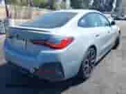 2023 BMW i4 eDrive40 with VIN WBY73AW09PFN59684, listed as a IAAI auction lot 42011700 with 16,950 mi miles and . Bid and sale history available at DreamBid. Image 4.