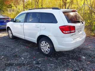 2014 Dodge Journey SE with VIN 3C4PDDAG9ET282199, listed as a IAAI auction lot 43430504 with 97,421 mi miles and . Bid and sale history available at DreamBid. Image 3.