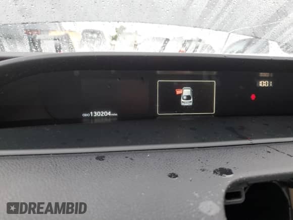 2019 Toyota Prius LE с VIN JTDL9RFU4K3011215, выставлен на аукционе Copart как лот 82524815 с пробегом 130 204 миль миль и Списание • Salvage title. История ставок и продаж доступна на DreamBid. Изображение 9.