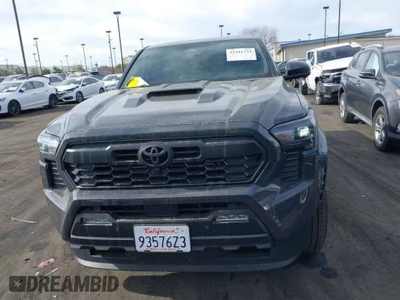 2024 Toyota Tacoma SR5 with VIN 3TMLB5JN5RM051339, listed as a IAAI auction lot 41241754 with 7,181 mi miles and . Bid and sale history available at DreamBid. Image 13.