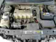 1997 Saturn SC with VIN 1G8ZF1286VZ350275, listed as a Copart auction lot 83010514 with 143,241 mi miles and Salvage title. Bid and sale history available at DreamBid. Image 13.
