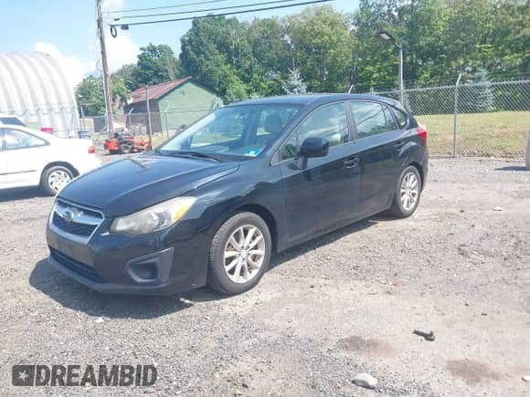 2012 Subaru Impreza Premium with VIN JF1GPAC66CH226572, listed as a IAAI auction lot 42815250 with 160,116 mi miles and . Bid and sale history available at DreamBid. Image 2.