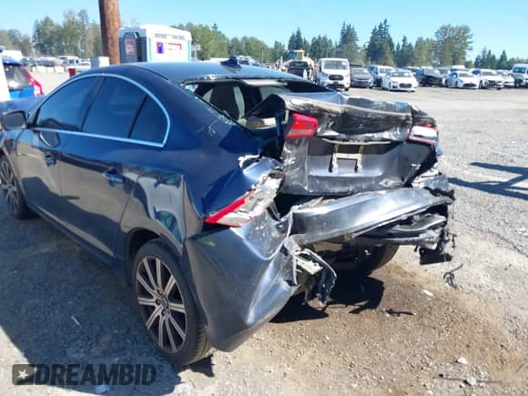 2015 Volvo S60 T5 Drive-E Premier with VIN YV126MFB5F1299795, listed as a IAAI auction lot 43052703 with 100,066 mi miles and . Bid and sale history available at DreamBid. Image 6.