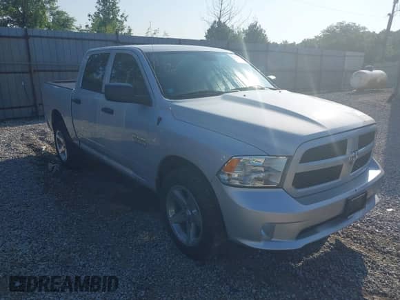 2015 Ram 1500 Express with VIN 1C6RR7KG4FS672275, listed as a IAAI auction lot 42452907 with 161,265 mi miles and . Bid and sale history available at DreamBid. Image 1.