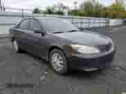 2002 Toyota Camry LE with VIN 4T1BE32K72U508340, listed as a Copart auction lot 86317005 with 216,628 mi miles and Salvage title. Bid and sale history available at DreamBid. Image 4.