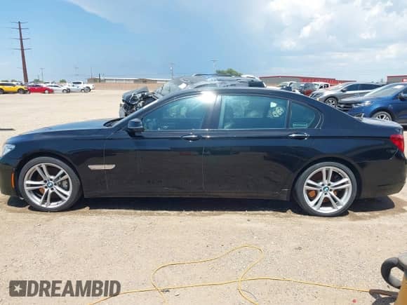 2014 BMW 7 Series ALPINA B7 xDrive with VIN WBAYF8C58ED142620, listed as a IAAI auction lot 42789758 with Not provided miles and . Bid and sale history available at DreamBid. Image 14.