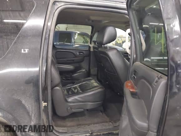 2011 Chevrolet Suburban LT with VIN 1GNSKJE32BR237123, listed as a IAAI auction lot 43063476 with 271,324 mi miles and . Bid and sale history available at DreamBid. Image 8.