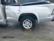 2001 Dodge Dakota Sport с VIN 1B7GG22N61S260178, выставлен на аукционе IAAI как лот 41033073 с пробегом Не указан миль и . История ставок и продаж доступна на DreamBid. Изображение 14.
