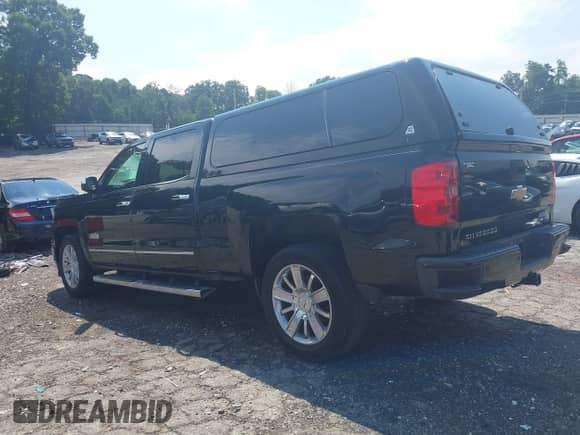 2015 Chevrolet Silverado 1500 High Country z VIN 3GCPCTEC7FG385328, wystawiony jako IAAI lot #43036924 z przebiegiem 155 391 mil mil oraz . Historia ofert i sprzedaży dostępna na DreamBid. Obrazek 3.