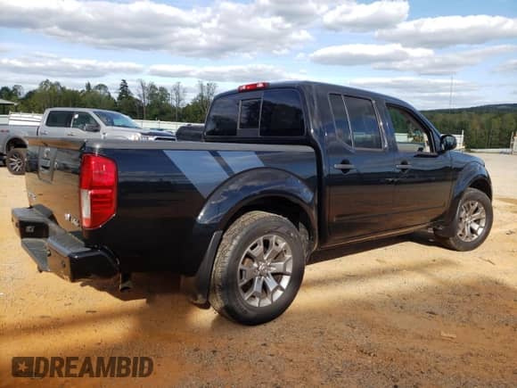 2020 Nissan Frontier SV with VIN 1N6ED0EB2LN727732, listed as a Copart auction lot 84923945 with 23,303 mi miles and Salvage title. Bid and sale history available at DreamBid. Image 3.